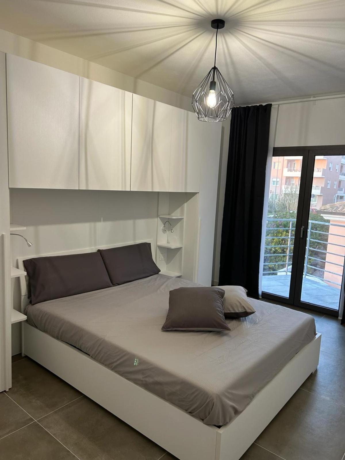 Family House Apartment Porto Torres Exterior foto