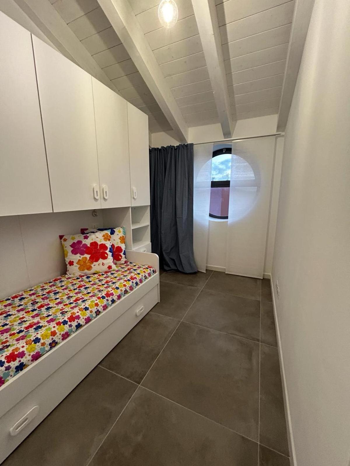 Family House Apartment Porto Torres Exterior foto