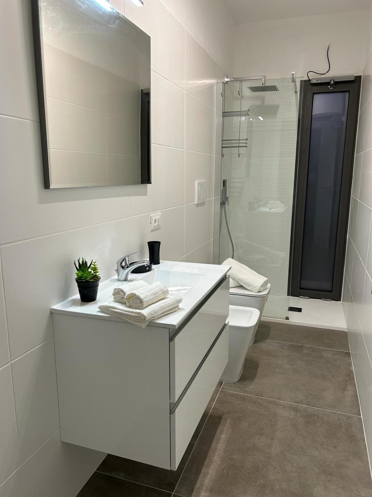 Family House Apartment Porto Torres Exterior foto
